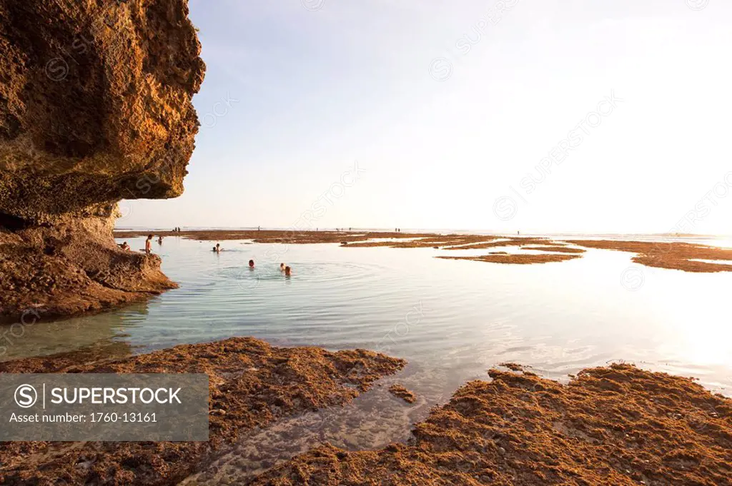 Indonesia, Bali, View from tidal pools and reef at sunset