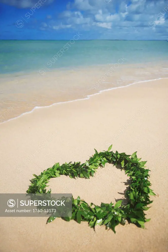 Hawaii, Oahu, Kualoa, Heart shaped Maile Lei on the beach