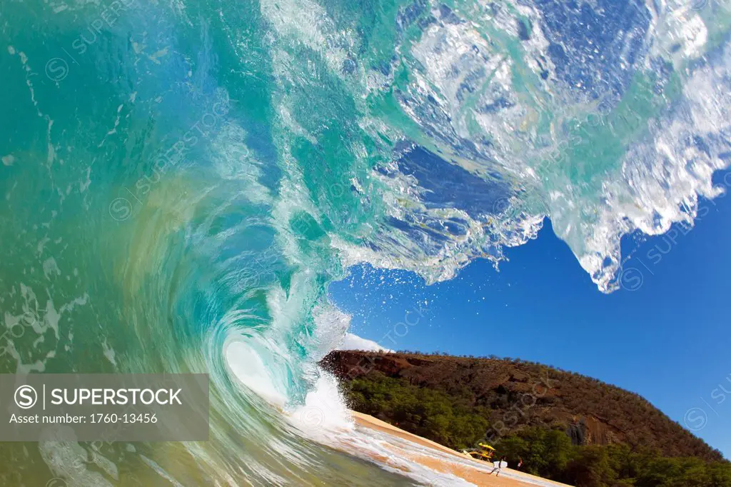 Hawaii, Maui, Makena Beach, Wave breaking along shore.