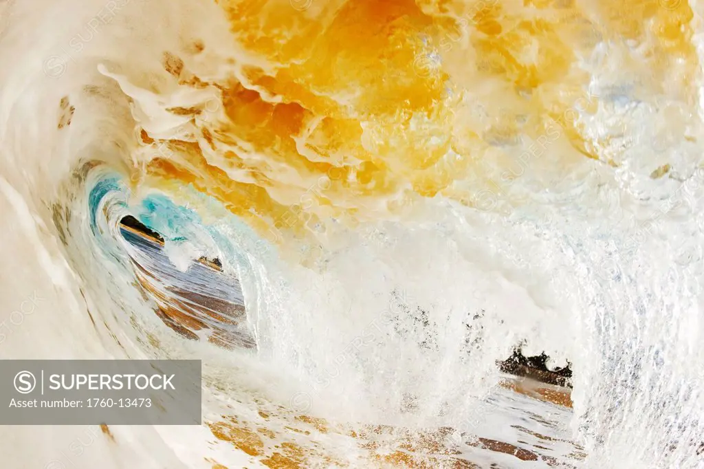 Hawaii, Maui, Makena Beach, View through tube of sandy wave.