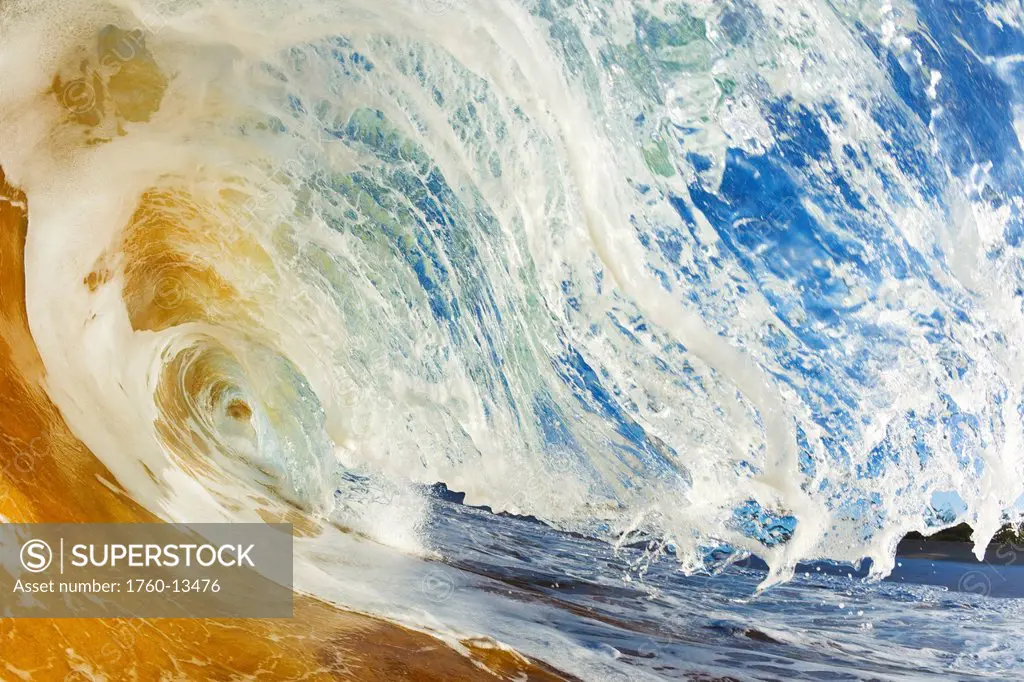 Hawaii, Maui, Makena Beach, View through tube of sandy wave.