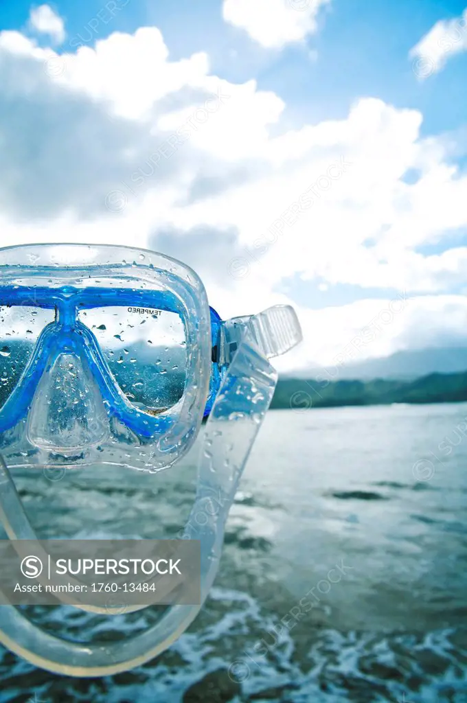 Hawaii, Kauai, North Shore, Hanalei Bay, Snorkel mask and ocean in background.