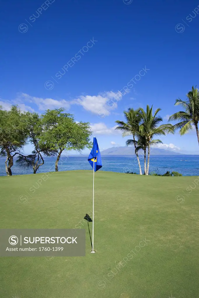 Hawaii, Maui, Makena South Golf Course, hole #16, putting green next to the ocean.