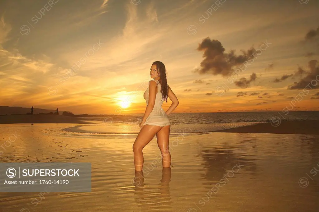 Hawaii, Sexy woman on beach, Sunset light.