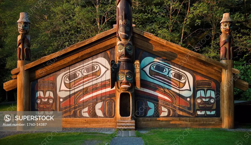 Alaska, Ketchikan, Totem Bight State Historical Park, Clan house with totem poles.