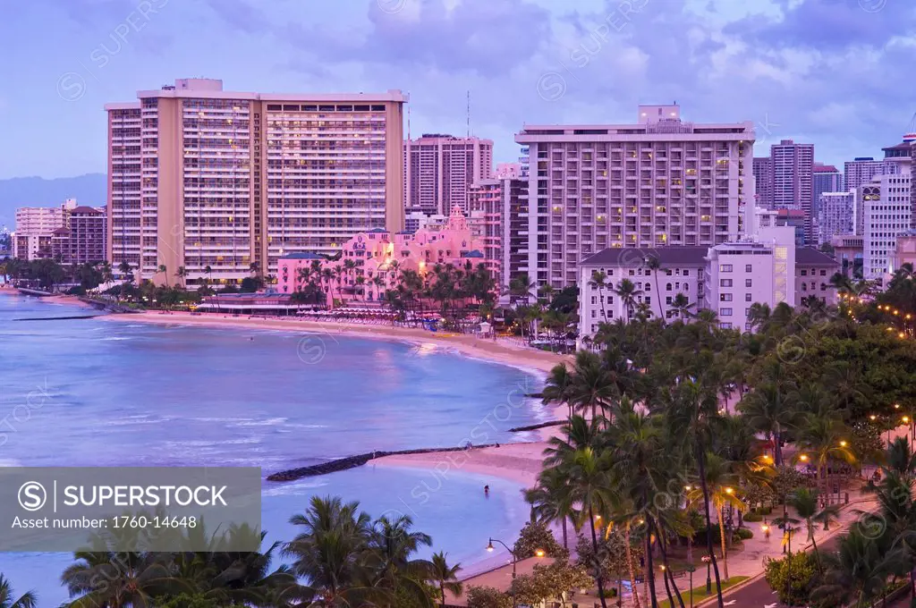 Hawaii, Oahu, Waikiki, View of waikiki hotels and beach at sunrise.