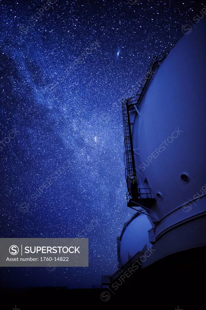 Hawaii, Big Island, Mauna Kea summit, Keck observatory at night and the Milky Way, Low light exposure.