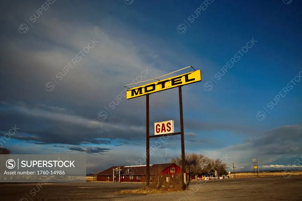 New Mexico, Old motel and gas sign along country road. Editorial Use Only.