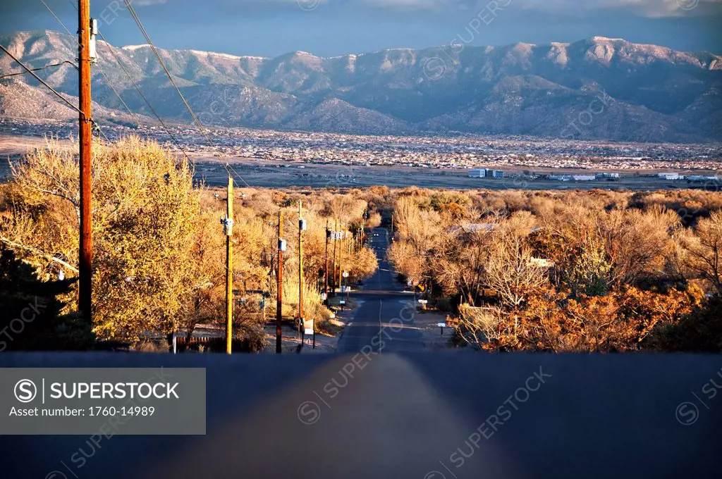New Mexico, Road in Corrales, View of Rio Grande Valley and Sandia Mountains.