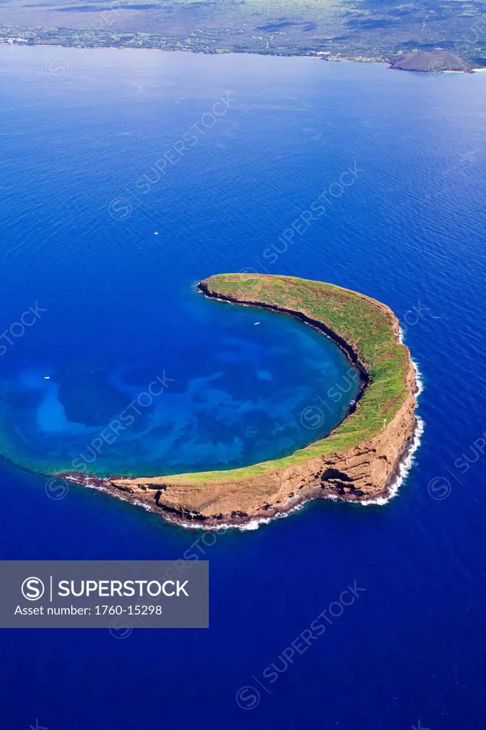 Hawaii, Maui, Molokini, Aerial shot of the islet, Maui in distance.