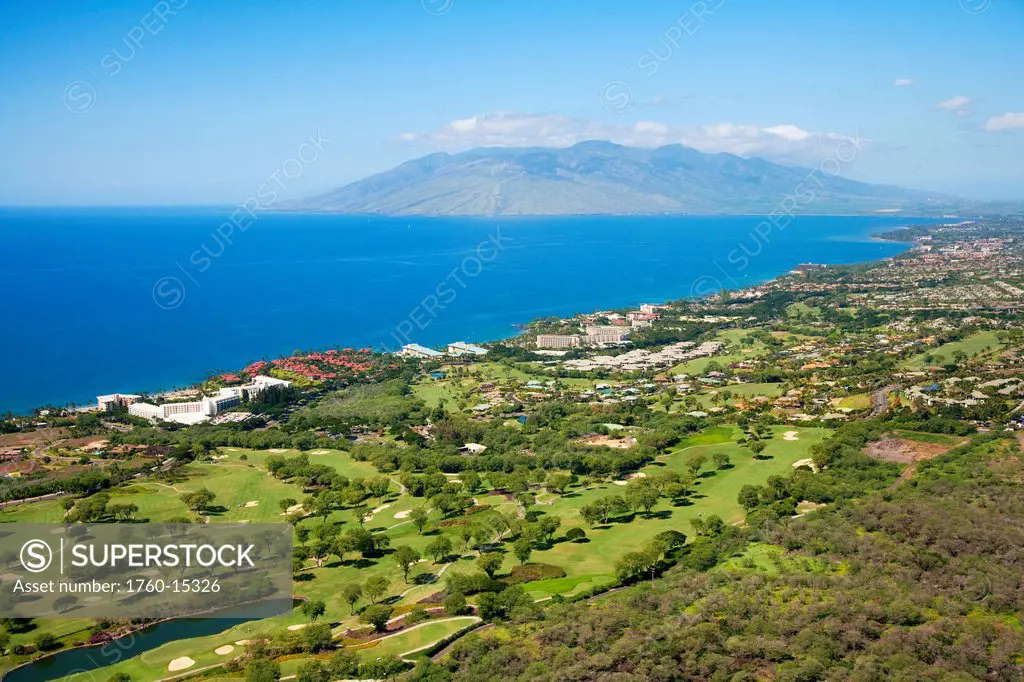 Hawaii, Maui, Wailea coastline, Aerial of Wailea golf courses, West Maui Mountains in the background.