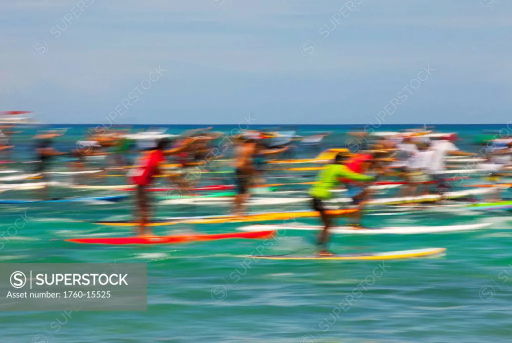 Hawaii, Oahu, Waikiki, Competitors of ´Battle of the Paddle,´ blurred image. EDITORIAL USE ONLY