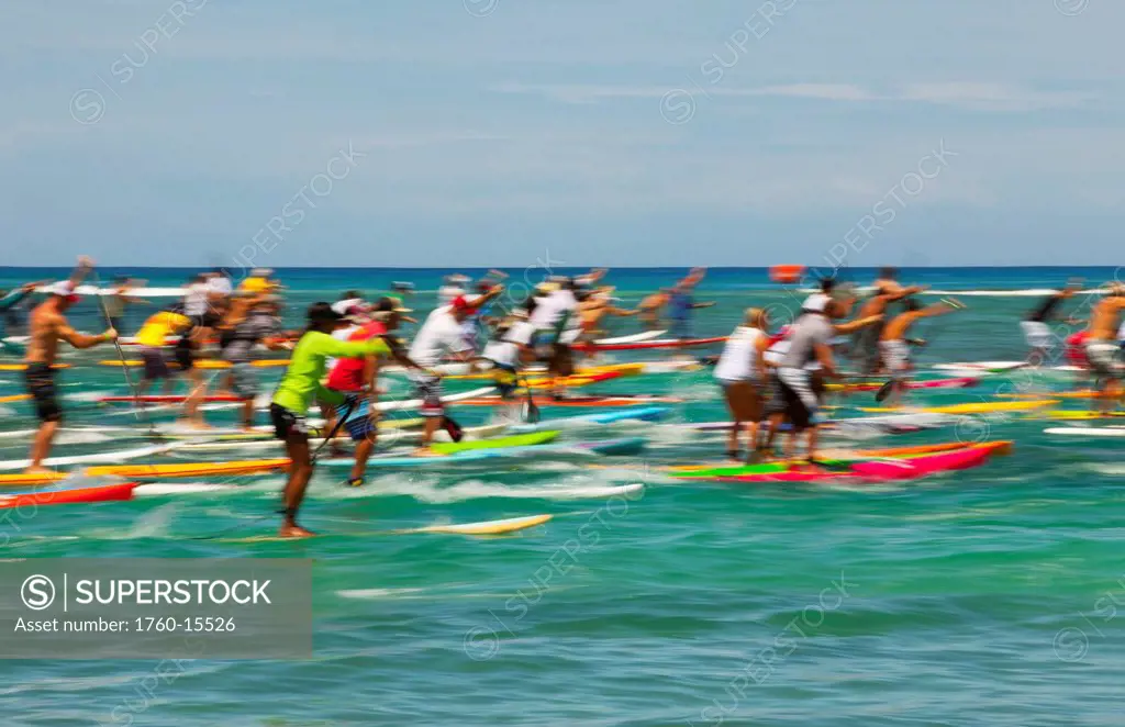 Hawaii, Oahu, Waikiki, Competitors of ´Battle of the Paddle,´ blurred image. EDITORIAL USE ONLY