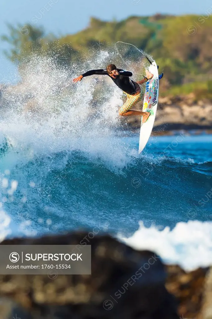 Hawaii, Maui, Kapalua, Professional surfer Albee Layer catches air off a wave. FOR EDITORIAL USE ONLY.