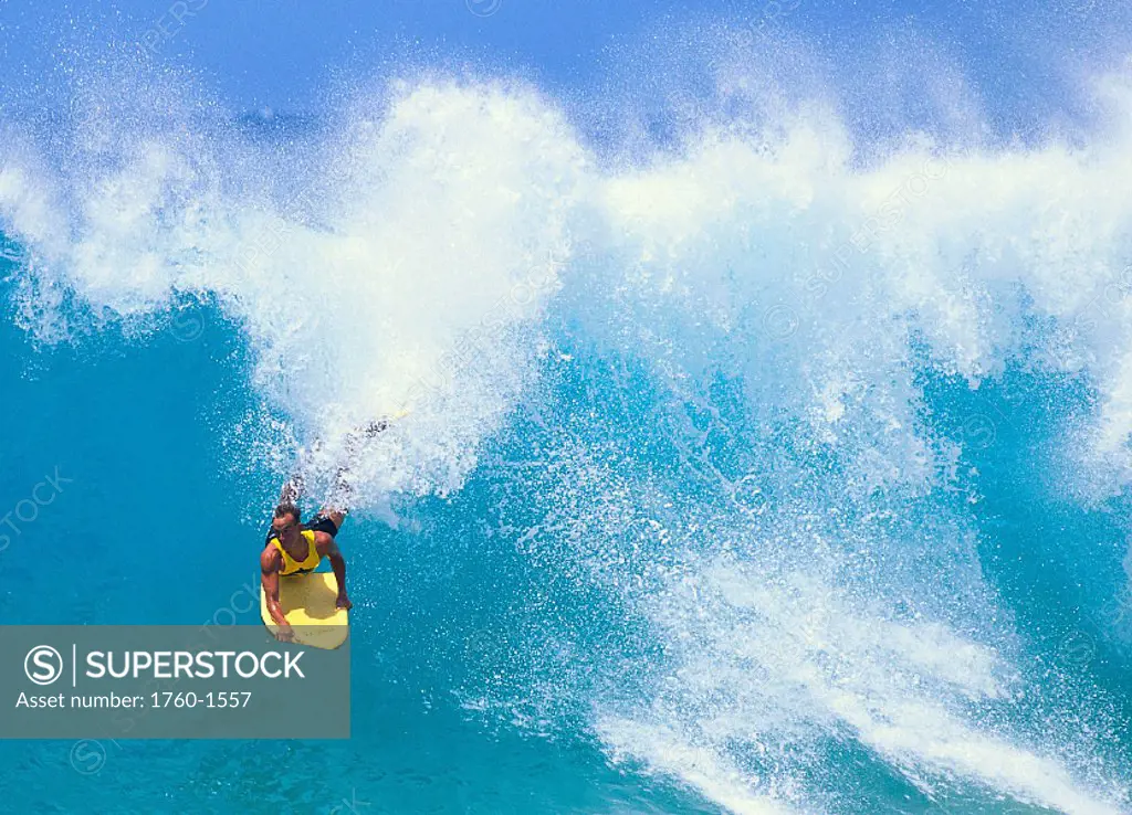 Hawaii, Body boarder Haouli Reeves in crashing turquoise wave C1421