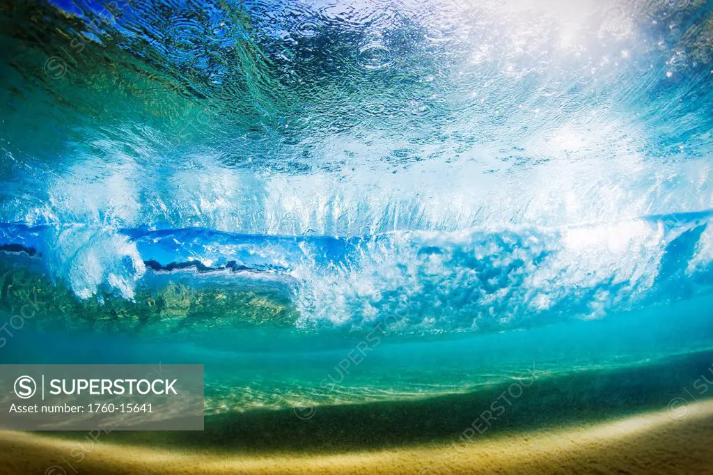 Hawaii, Maui, View of a breaking wave from underwater