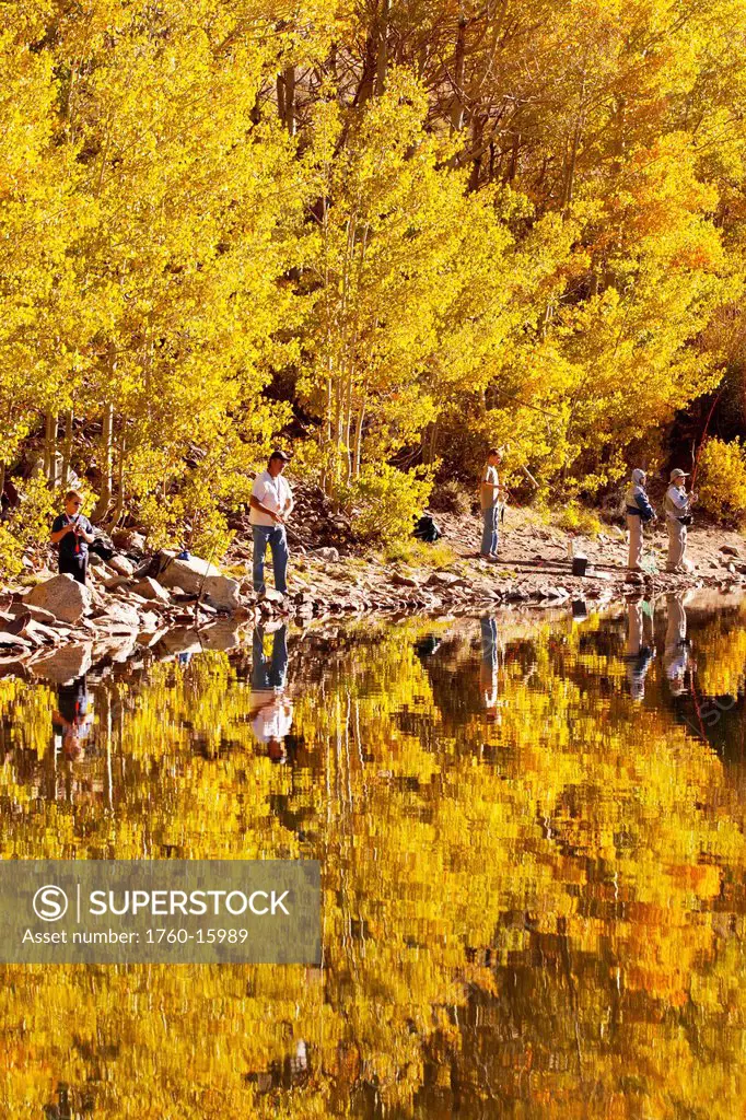 California, Eastern Sierras, People fishing in a beautiful mountain lake