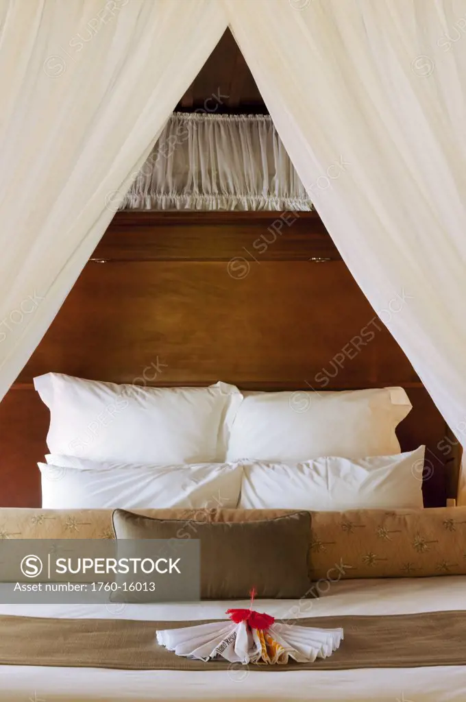 Fiji, Matangi Private Island Resort, Bedroom in guest bure.