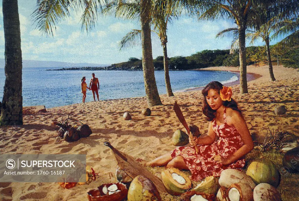 c.1965 Hawaii, Postcard of woman cutting coconuts on beach, couple in background