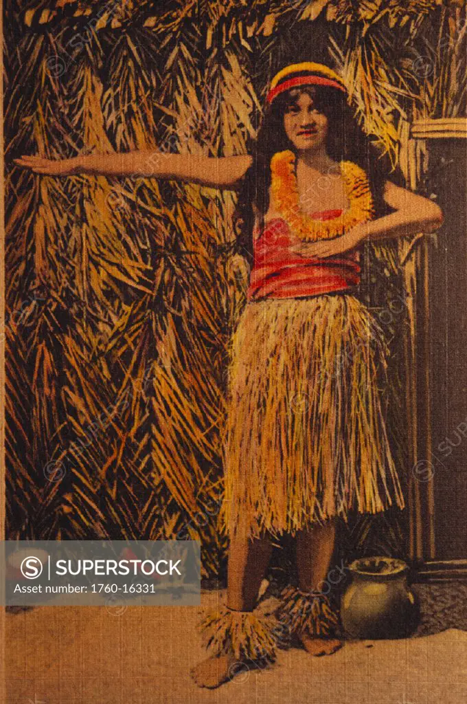 Full length view of Hula dancer with lei standing in front of straw hut, Hawaiian Antique postcard, Curteich Co.