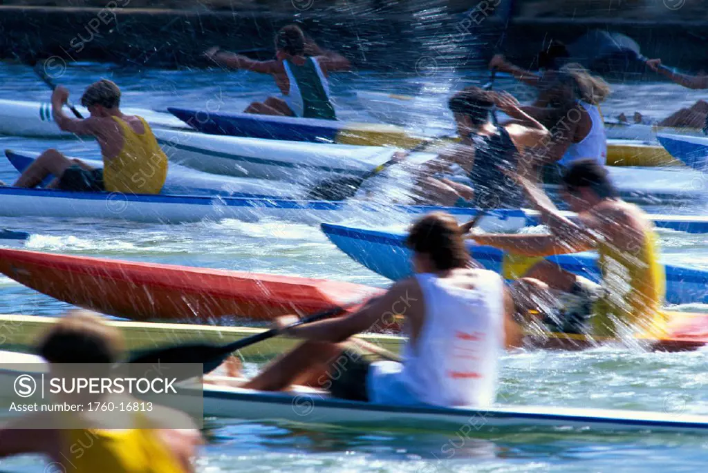 Young men in kayak race, start of race, blurred action B1226