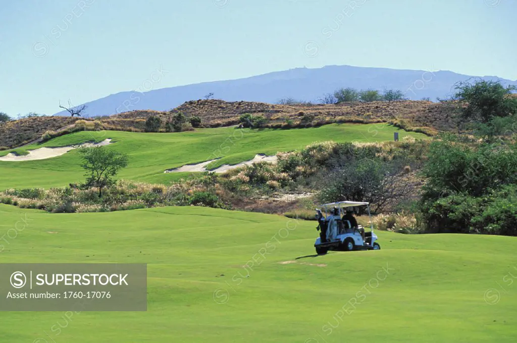 Hawaii, Big Island, Hapuna Prince Golf Course, Golfers in cart