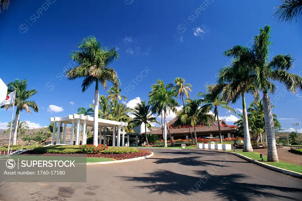 HI, Oahu, entranceway to Koolina Golf Course Clubhouse, blue sky & palms