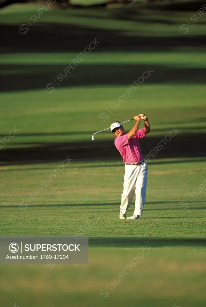 Hawaii, Maui, Spreckelsville Country Club, full length front view of Jim Bendon fairway shot shadows