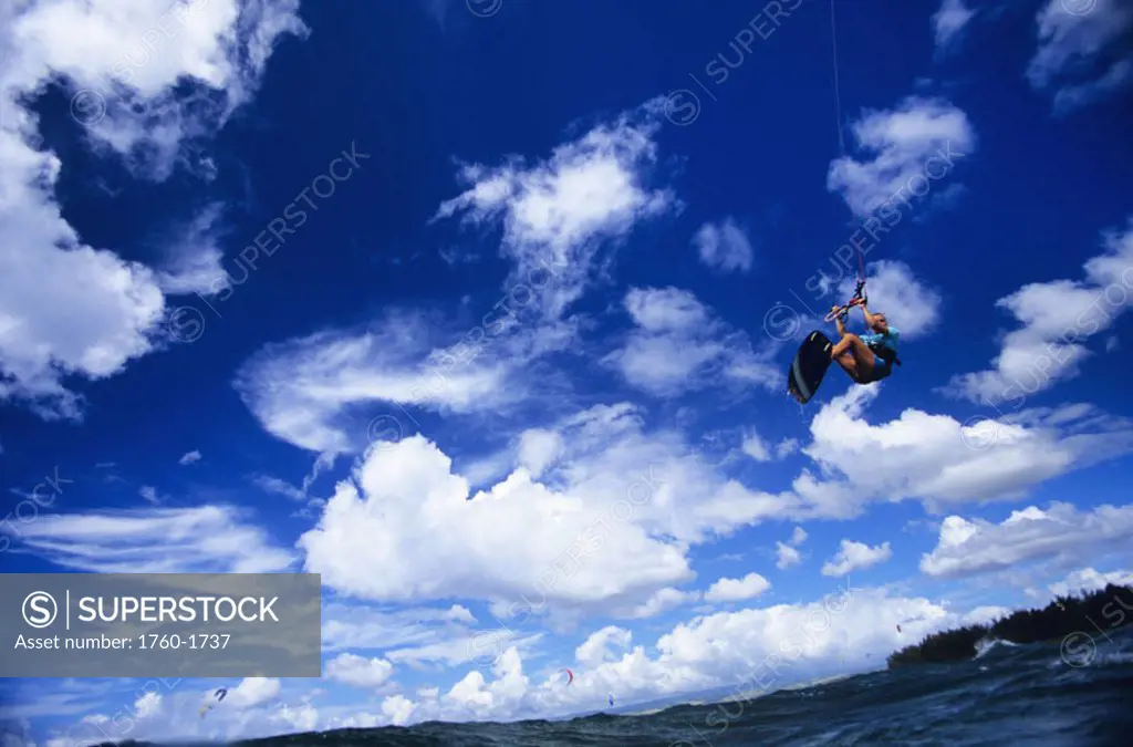 Hawaii, Oahu, North Shore, Mokuleia Beach Park, airborne kite surfer, view from below. NO MODEL RELEASE