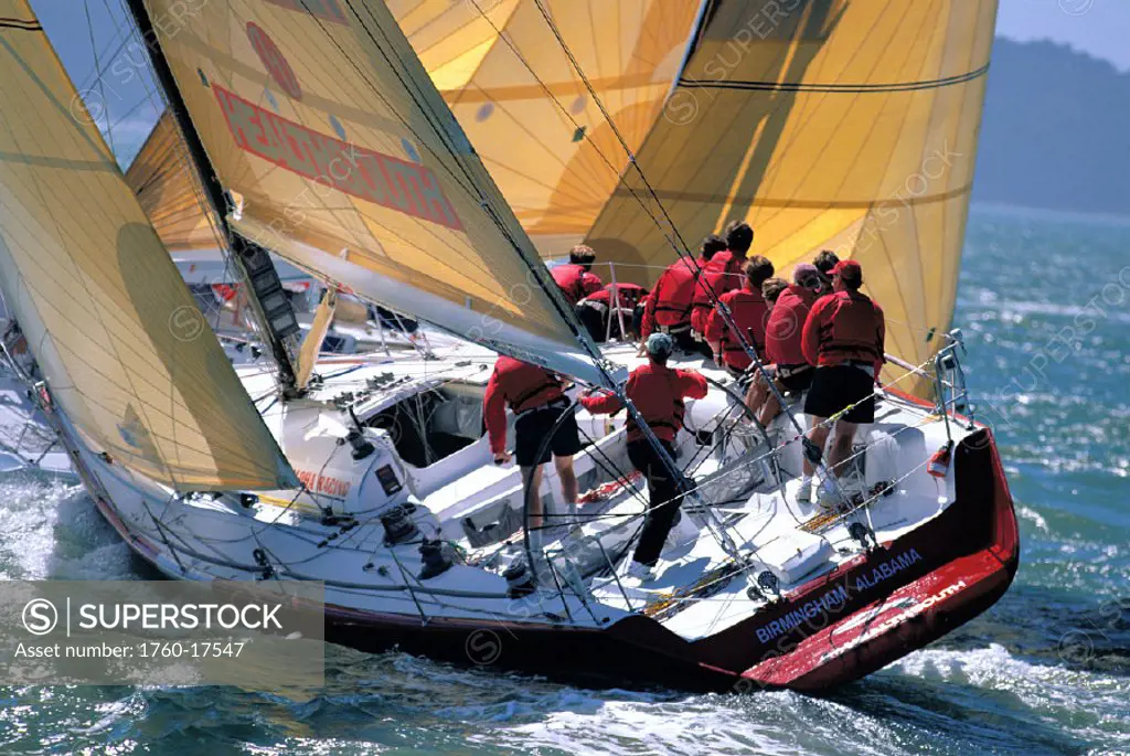 Big Boat Series, Close tacking upwind, side rear view of crew on yacht