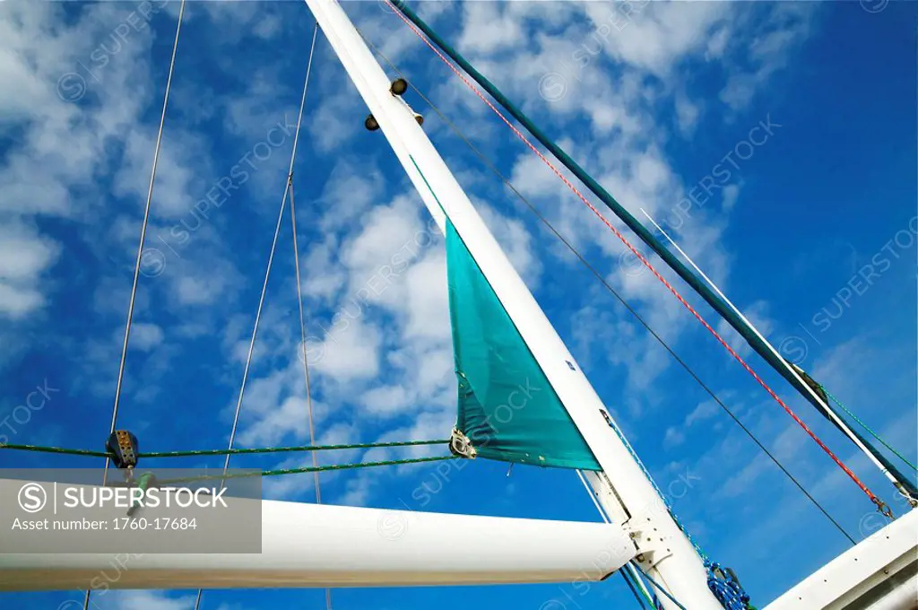Hawaii, Kauai, View from below of the sails of a sail boat.