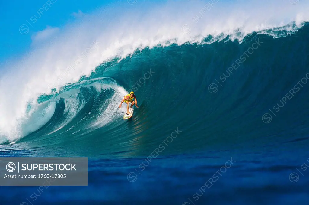 Hawaii, Oahu, Liam (surfer) surfing Pipeline wave.