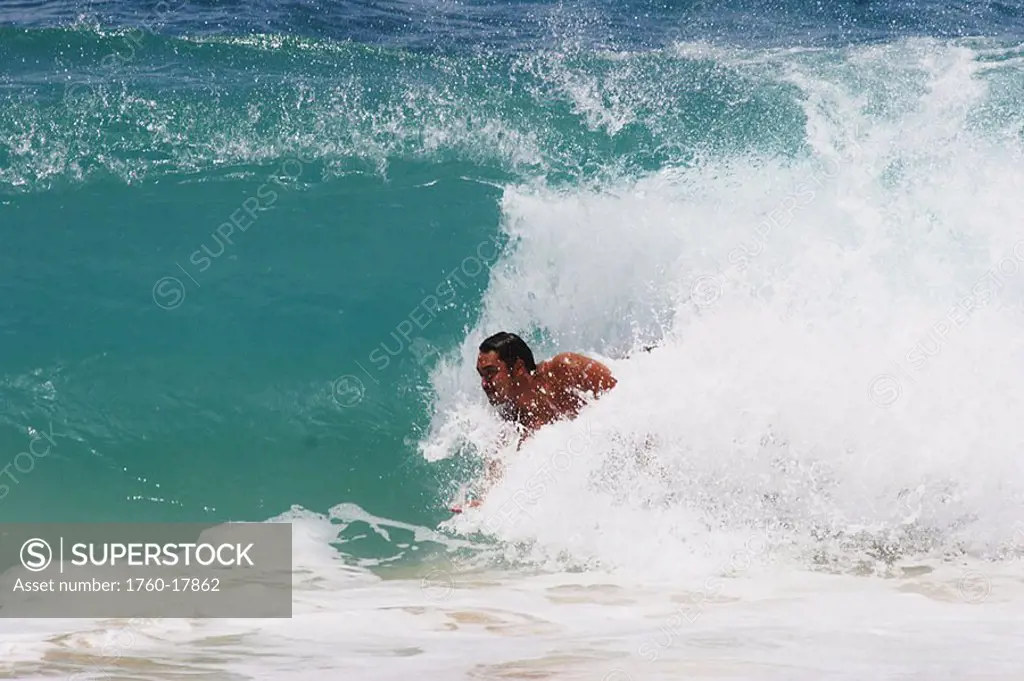 Hawaii, Oahu, Sandy Beach, Bodysurfer rides a wave