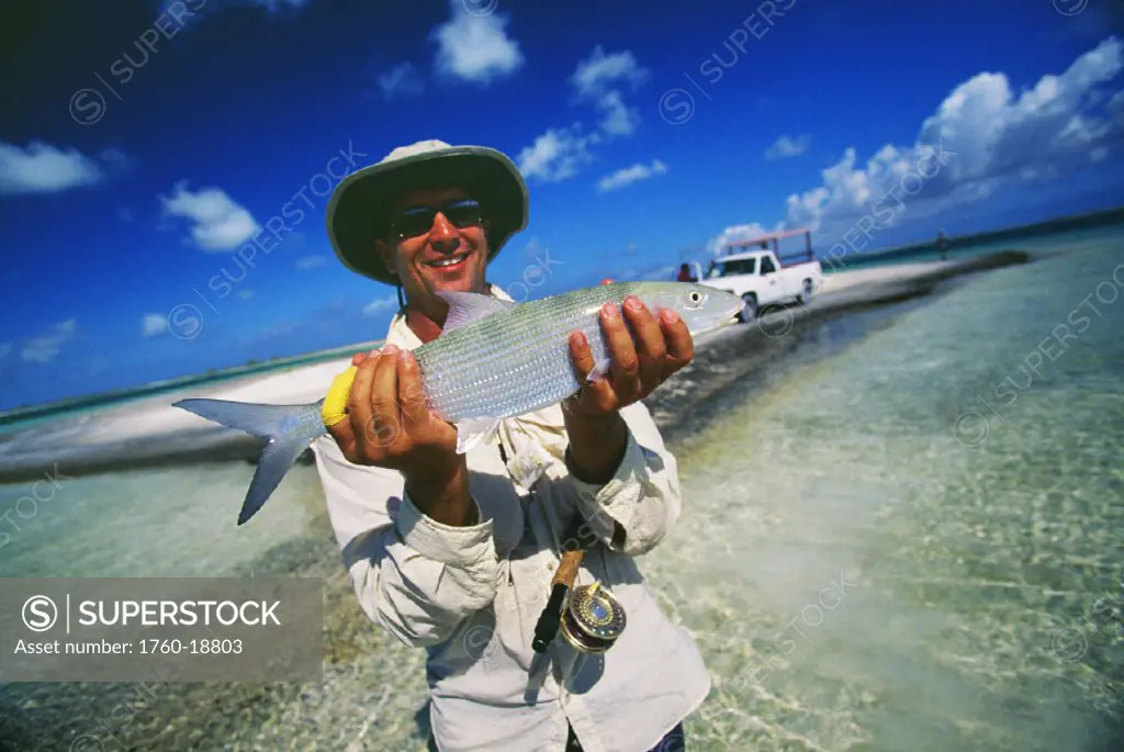 Christmas Island, Fred Haywood holding a 4Pound Bonefish.