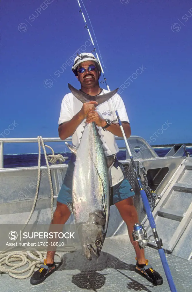 Marshall Islands, Bikini Atoll, fisherman holding big tuna