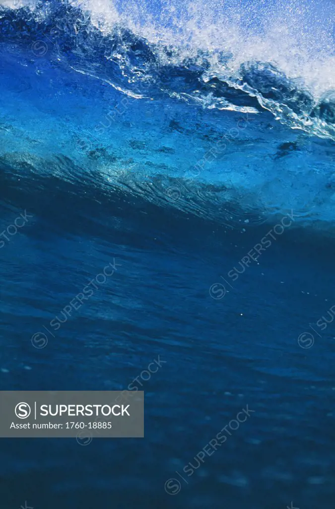 Hawaii, Big blue wave begins to crash.