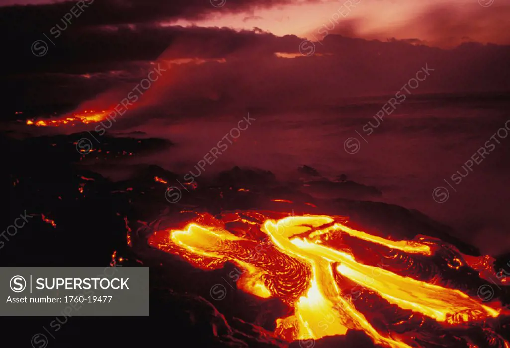Hawaii, Big Island, Hawaii Volcanoes National Park, lava flow glows in early dawn