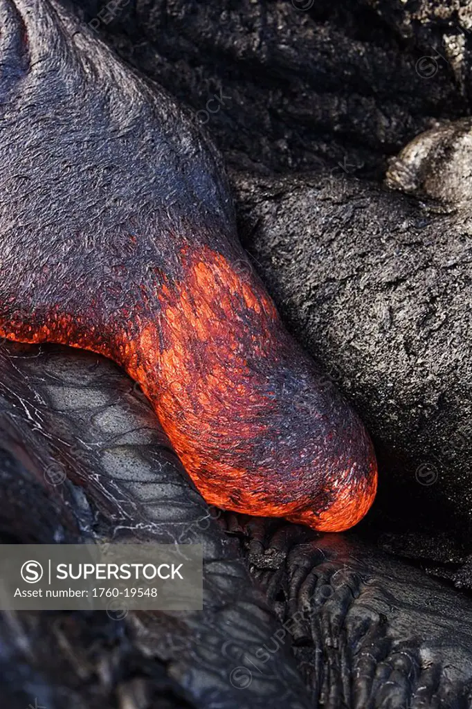 Hawaii, Big Island, Hawaii Volcanoes National Park, Kilauea Volcano, Detail of flowing molten pahoehoe lava