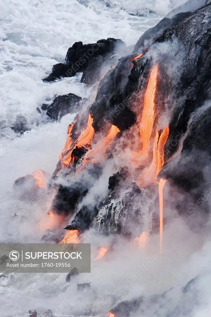 Hawaii, Big Island, near Kalapana, Pahoehoe lava flowing from Kilauea into Pacific Ocean