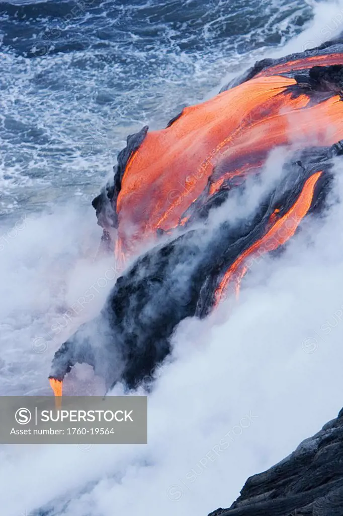 Hawaii, Big Island, near Kalapana, Pahoehoe lava flowing from Kilauea into Pacific Ocean