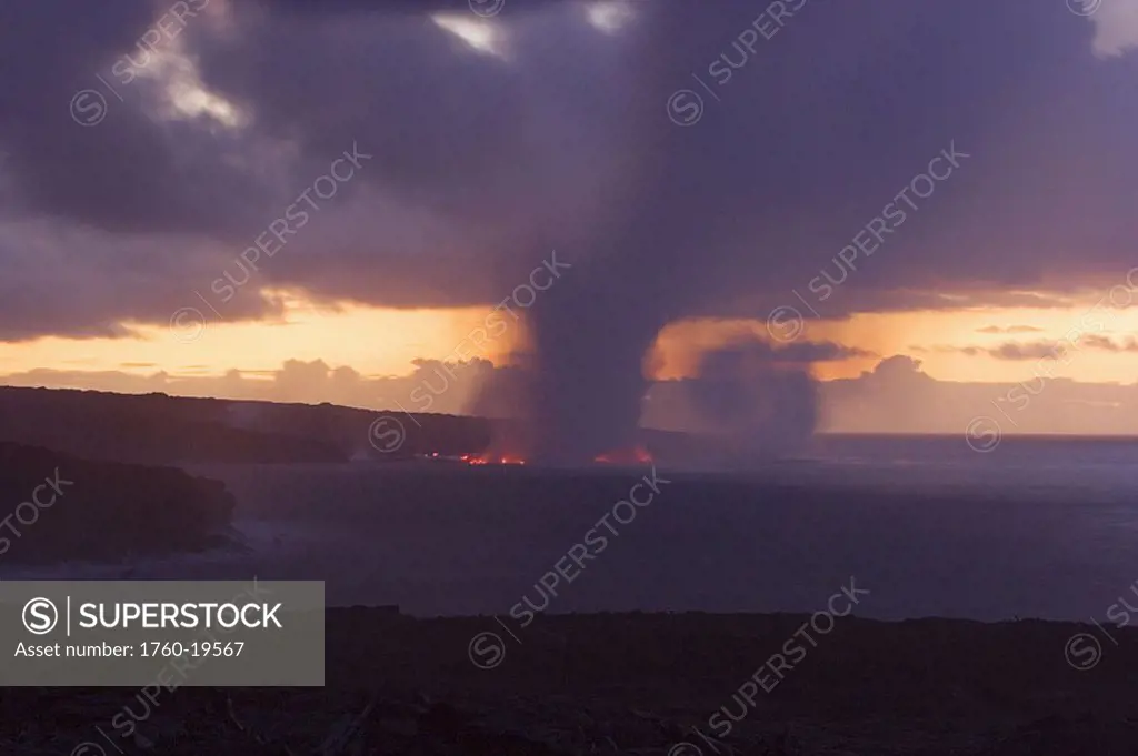 Hawaii, Big Island, Kalapana, Steam cloud formed by lava entering Pacific Ocean from Kilauea