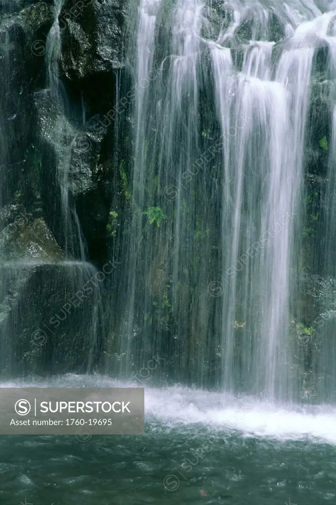 HI, Maui, Hana, waterfall and pool below, shower of falls splashing