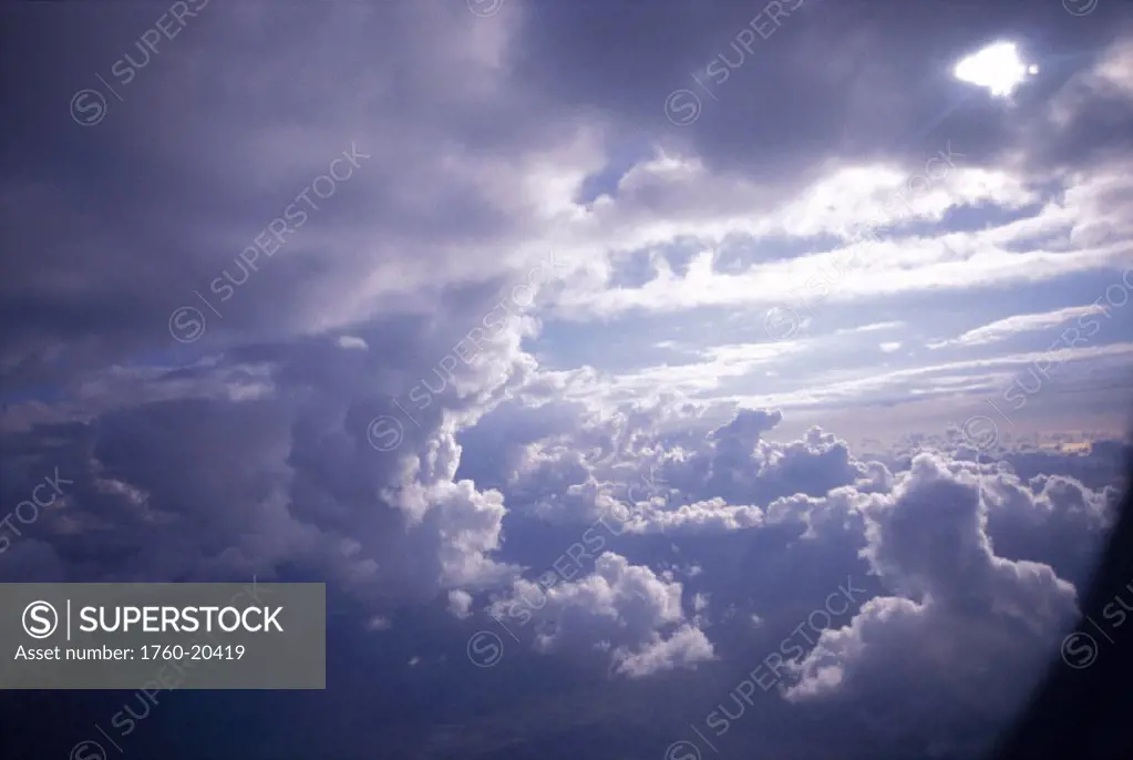 Closeup of thick clouds in afternoon sky D1657