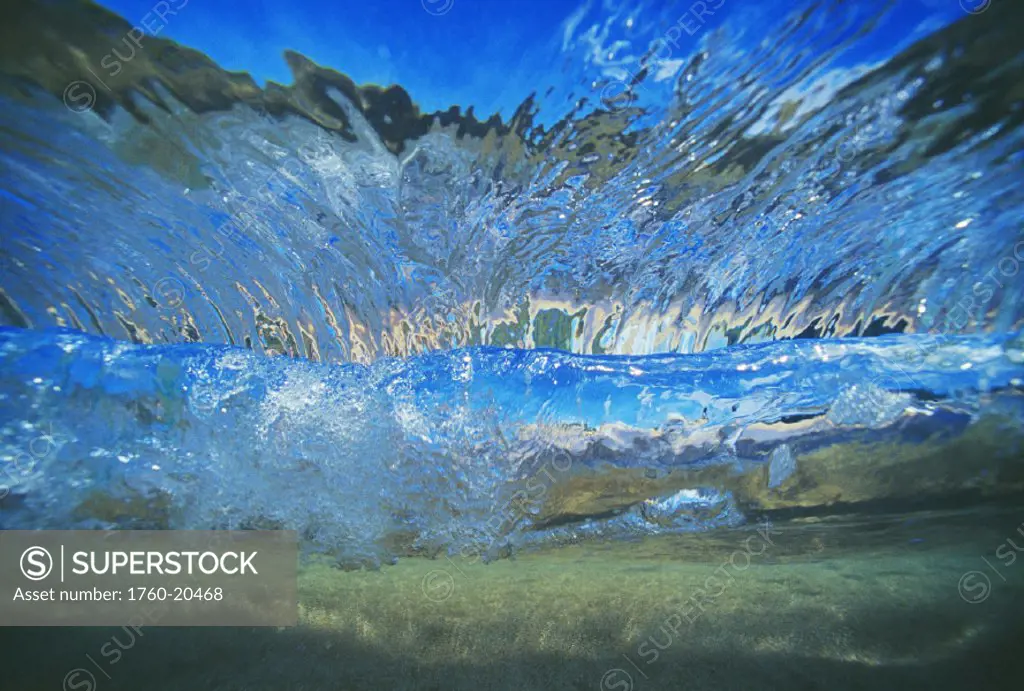 Abstract underwater view of waves and surf.