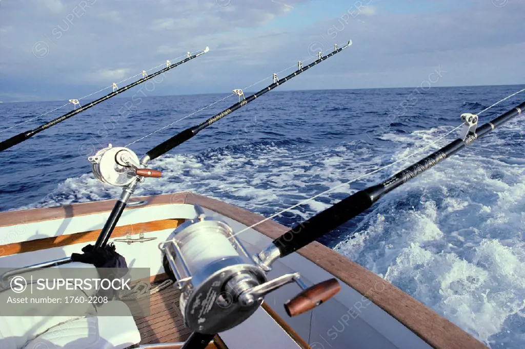 Hawaii, closeup of fishing rods & reels on a boat deep sea fishing C1376