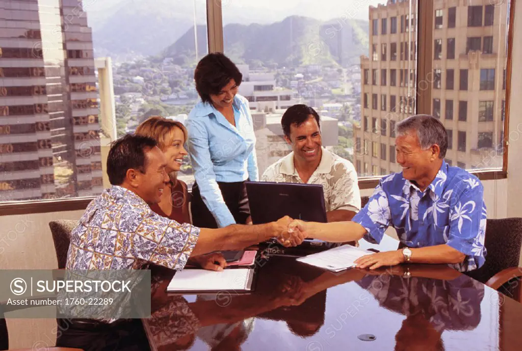 Hawaii, Businessmen and woman at conference table