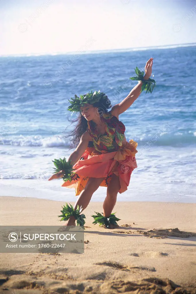 Hula kahiko style on the beach, soft lighting, leaf leis on neck, head and arms