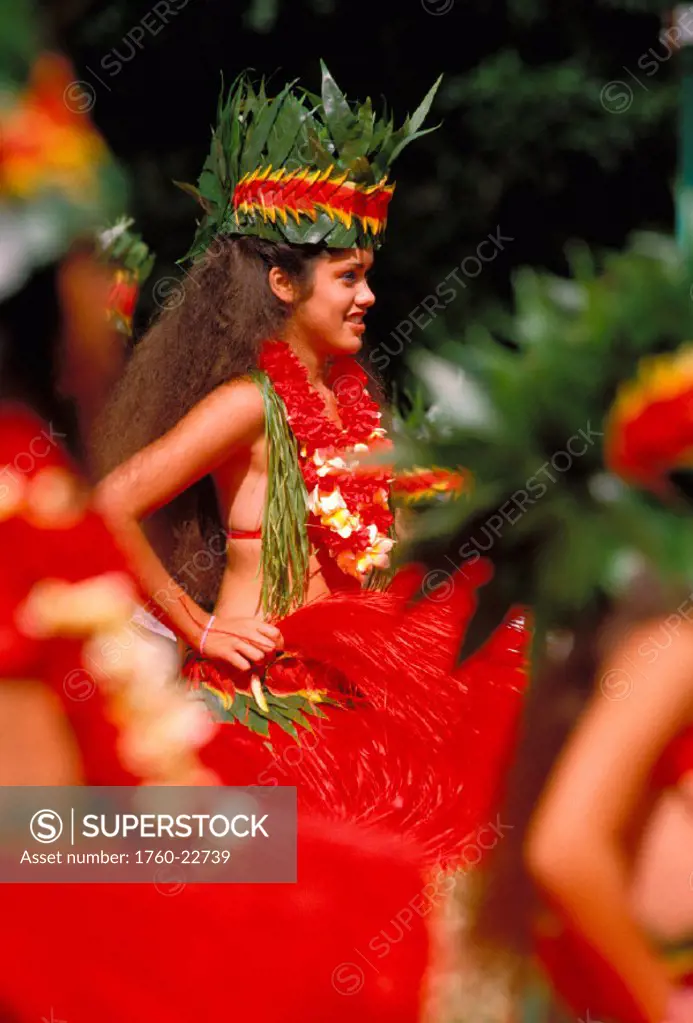 Hawaii, Keiki Tahitian Dancer, view of young girl wearing red costume in sun