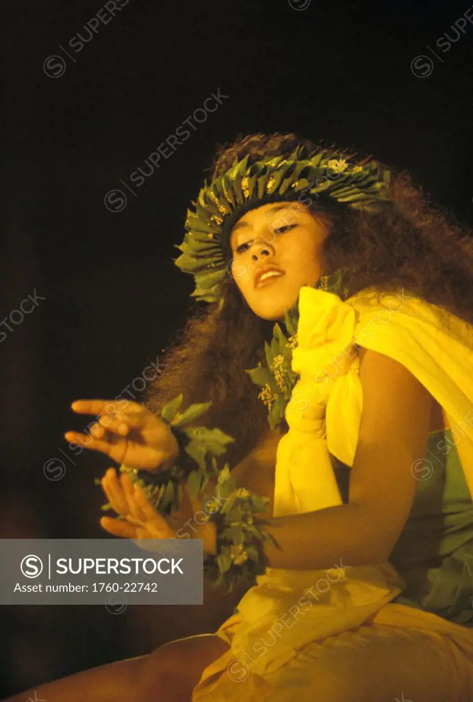 Hawaii, Big Island, Merrie Monarch Hula Festival, woman gracefully performing hula.