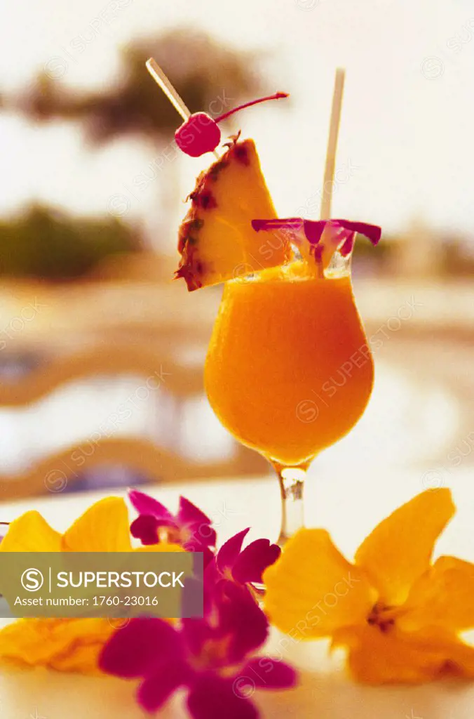 Tropical drink with tropical flowers